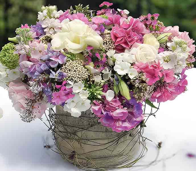 English Cottage Flowers in rustic vase