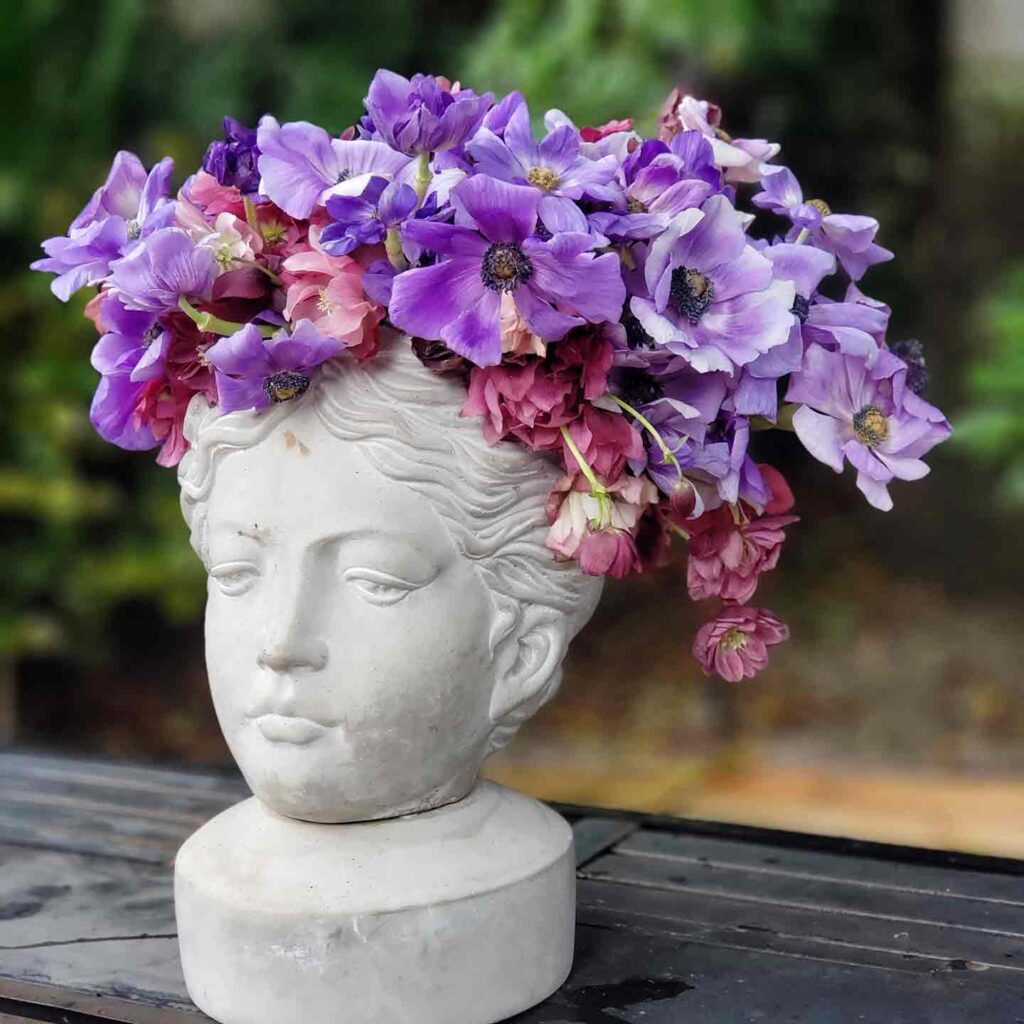 Woman with purple flowers on her head